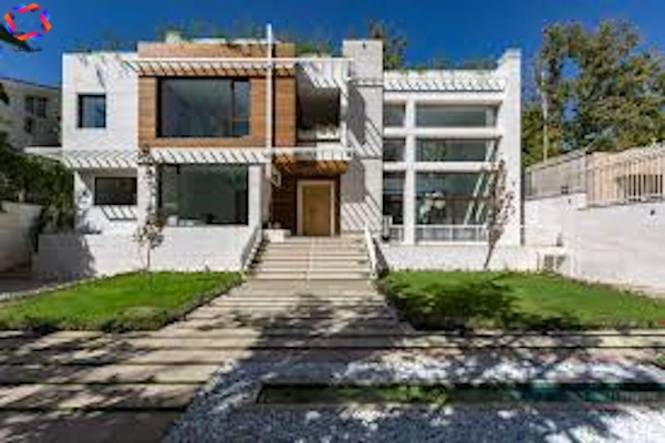 Image of a two-story house with a large yard used on the Shimelk website for the article Comprehensive Guide to Renting a House.